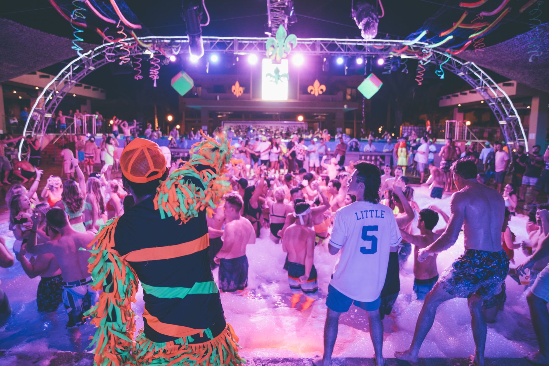 Ibiza club crowd neon lights